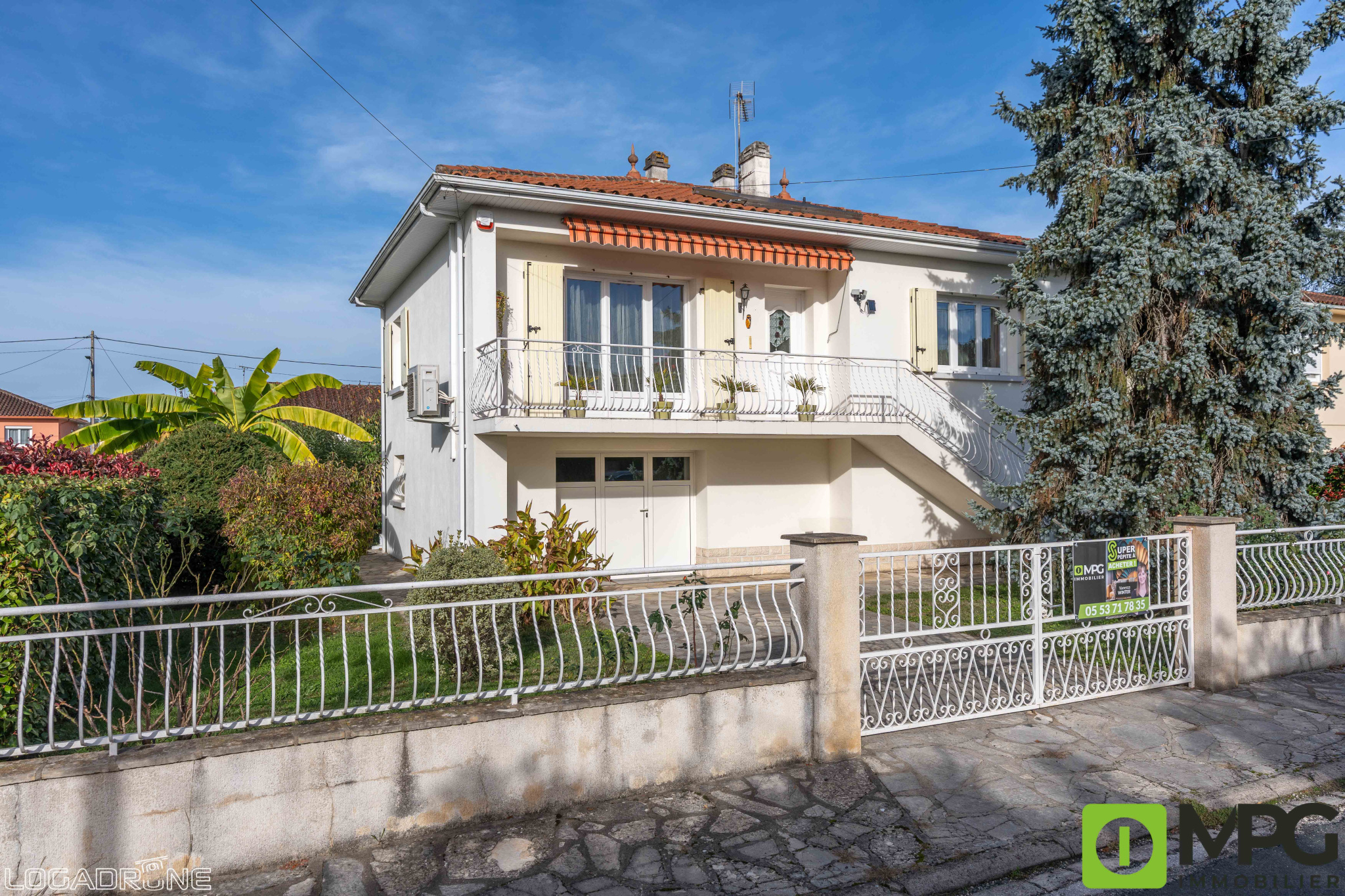 Maison sur étage avec garage , jardin.