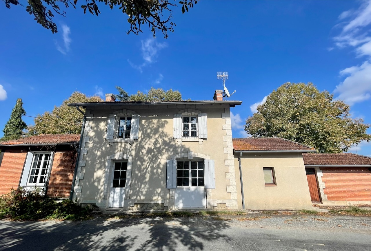 Maison 3 chambres, garage.